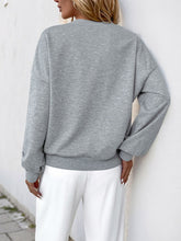Perfee Cutout Pearl Round Neck Long Sleeve Sweatshirt OutfitFlow